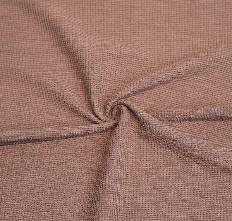 Hvordan påvirker vaffelstrukturen ydelsen af bambus/polyester -strækningsvaffel?
